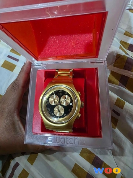 Swatch dorado 2011